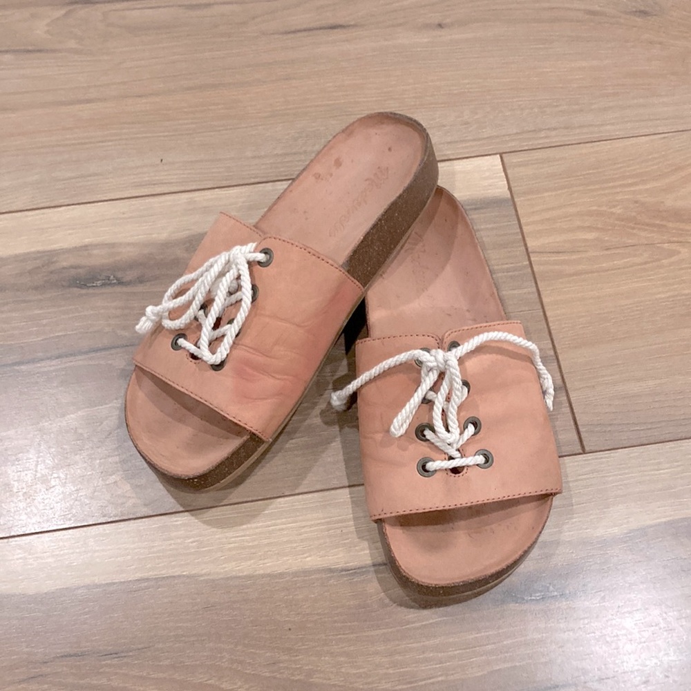 Pink leather slides